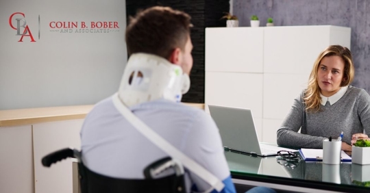 injured person talking to a lawyer